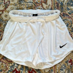 White Nike shorts